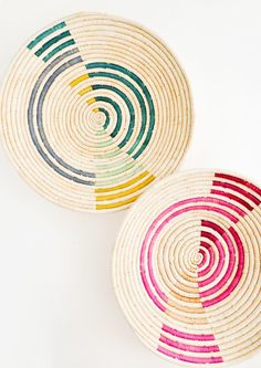 two baskets with different colored lines on them