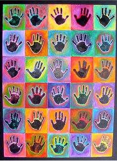 an art project with handprints in different colors