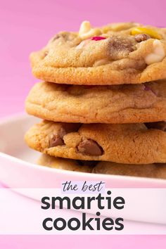 the best smartie cookies recipe is in front of a pink background with text overlay