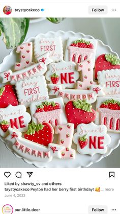 some decorated cookies are on a plate with the words first, first and no one