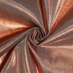 a close up view of a metallic fabric