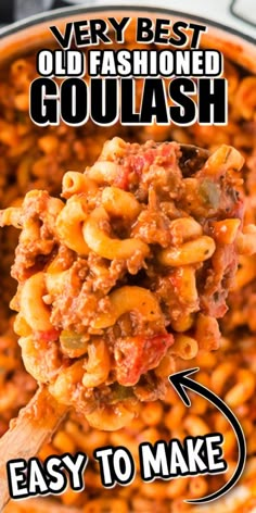 a wooden spoon full of macaroni and cheese with the words, very best old fashioned goulash easy to make