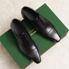 Step into sophistication with our elegant carved British leather business shoes. Crafted from the finest first layer cowskin upper and lined with luxurious pigskin, these shoes exude style and comfort. With a round toe shape, lace-up closure, and a durable rubber outsole, these shoes are perfect for any formal occasion. Elevate your business attire and make a lasting impression with our exquisite leather business shoes. Classic Leather Shoes With Pointed Toe For Business, Classic Round Toe Oxfords For Business Meetings, Classic Leather Shoes With Pointed Toe For Business Meetings, Black Leather Oxfords For Business Meetings, Classic Pointed Toe Leather Shoes For Business Meetings, Elegant Black Dress Shoes For Business Meetings, Classic Pointed Toe Oxfords For Business, Classic Pointed Toe Oxfords For Business Meetings, Brogue Detailed Leather Shoes For Business Meetings