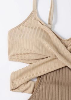 This exquisite bodysuit offers a unique blend of sophistication and charm with its classy beige stripes and patchwork design. The backless style adds a touch of allure to this luxurious swimwear piece.Fabric: Cotton BlendedSize & Fit:high stretchHand Wash Cold. Criss Cross Bra, Backless Swimwear, Boho Elements, Swimming Costume, Beach Wear Dresses, Boho Casual, Boho Stil, Patchwork Designs, One Piece For Women