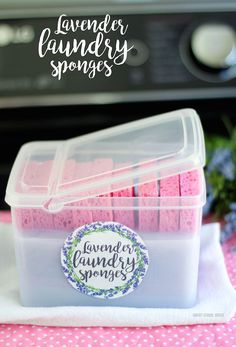 lavender laundry sponges in a plastic container on a pink tablecloth