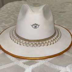 Gorgeous Custom Made Evil Eye Hat . Please See Photos For Reference/ Missing Two Little Pearls And Needs To Be Cleaned/ This Hat Was Imported From Mexico/ Mexicana White Fedora Felt Party Hat, White Fedora Felt Hat For Party, White Fedora Hat For Party, White Handmade Fedora With Short Brim, Luxury White Fedora, Handmade White Fedora With Flat Brim, Handmade White Felt Hat With Short Brim, Luxury Wide Brim White Hat, Handmade White Wide Brim Felt Hat