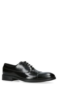 Classic and versatile, this oxford made of high-polish leather features a simple cap toe and a quilted footbed to cushion every step. Lace-up style Cushioned footbed Leather upper/synthetic lining and sole Made in Portugal Classic Fitted Oxfords With Leather Footbed, Classic Fitted Patent Leather Oxfords, Classic Patent Leather Cap Toe Oxfords, Summer Wardrobe Essentials, Wedding Guest Shoes, Sneaker Slippers, Sports Blazer, Baby Boy Shoes, Made Clothing