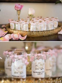 pink and gold wedding favors in glass jars