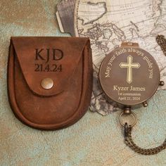 a personalized keychain and wallet with a map in the background