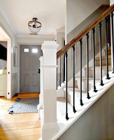 the stairs in this house are painted white