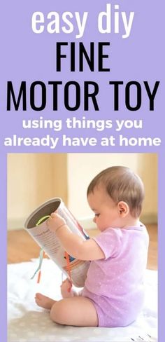 a baby sitting on the floor playing with a toy in front of a purple background