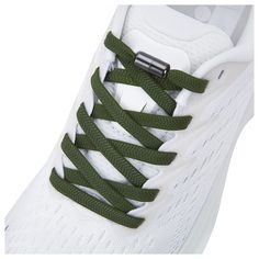 the shoe laces are attached to an athletic shoe in white and green color scheme