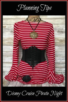 a red and white striped dress with black trimmings on the waist, is shown in