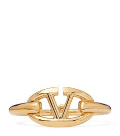 Find VALENTINO Vlogo Moon Bangle on Editorialist. Valentino Garavani knows exactly how beloved its VLOGO monogram is, so it doesnt just simply display it on a design - it works it into the architecture of the piece. The Moon bangle spotlights the emblem, casting it in gold-tone metal and turning it into a simple bangle. Luxury Jewelry With Metal Logo, Designer Formal Jewelry With Metal Logo, Designer Gold-tone Logo Bracelets As Gift, Designer Gold Jewelry With Metal Logo, Designer Gold Jewelry With Logo, Luxury Gold-tone Logo Plaque Bracelet, Luxury Jewelry With Metal Logo For Gift, Luxury Jewelry Gift With Metal Logo, Latest Bracelets