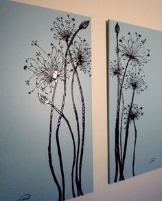 two paintings are hanging on the wall next to each other, one has dandelions in it