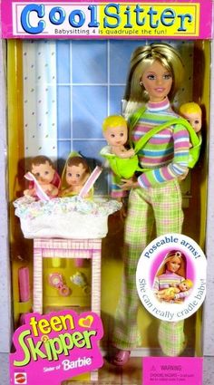 the doll is holding her baby and two other dolls