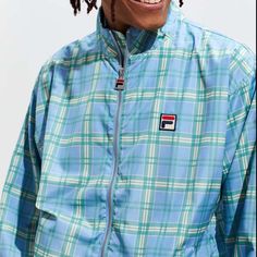 Brand New, With Tags, Never Been Used. Lightweight With A Uo-Exclusive Pattern, The Livingston Track Jacket From Fila Offers Poly Construction With Allover Plaid Detailing And Branded Hits At Zipper + Chest Icon. With A Zip Front Closure That Goes From Cinched Hem To Stand-Up Collar, This Jacket Is Complete With Cinched Elastic Cuffs And Front Slip Pockets. Material - Nylon Approximate Measurements - Chest: 22” Length: 26” Blue Nylon Track Jacket For Spring, Blue Nylon Track Jacket For Fall, Casual Blue Nylon Track Jacket, Blue Jacket Men, Fila Jacket, Fila Vintage, Varsity Letterman Jackets, Heavy Jacket, Letterman Jacket