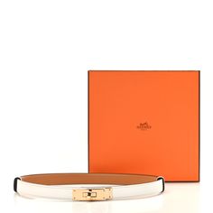 This is an authentic HERMES Epsom Kelly Belt in White. This belt is crafted of Epsom calfskin leather in white. This one-size-fits-most belt features a discreet sliding system and can be worn at the waist or low at the hips, secured with a rose gold-plated Kelly turn lock on the front. A Rose, Rose Gold Plates, Calf Skin, Gold Plate, Rose Gold, Turn Ons, Leather, Gold, White