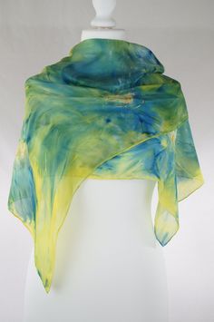 Blue yellow green bronze abstract silk scarf, hand dyed pure silk scarf, women silk scarf, gift for her, handmade Ticik-art This scarf is a unique product, original and timeless which you can wear daily or at special occasions, very light and soft, a special gift for you. DETAILS:  - Dimension 180 x 45 cm (71 x 18 inches) - 100 % pure silk (ponge 5) - High quality French colours - Hand rolled edges SPECIAL PLUS: This scarf is sent in a present/gift box with a beautiful card including care advice Elegant Hand Dyed Silk Scarf, Artistic Hand Dyed Blue Silk Scarf, Hand Dyed Scarves, Blue Silk Scarf, Long Silk Scarf, Artistic Hand-dyed Green Scarves, Yellow Scarf, Elegant Hand-dyed Multicolor Silk Scarf, Blue Bohemian Hand-dyed Silk Scarf