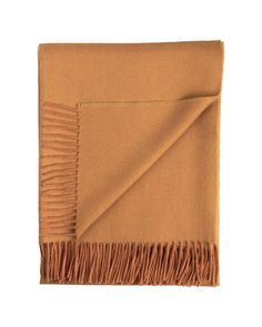 a tan blanket with fringes on it