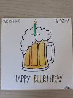 a birthday card with a beer mug and a candle