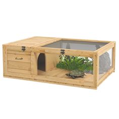 a large wooden box with plants inside and a turtle in the bottom half, on a white background