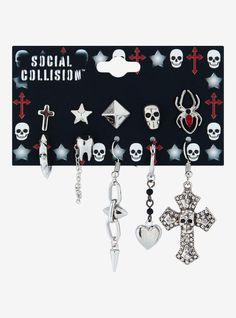 Bring some edge to your look with this mismatched earring set! It features single stud earrings starring a skull  star  spider and more  plus drop earrings with spikes  teeth  hearts and a rhinestone gothic cross.14" - 2 12" dropsNickel-free alloy; acrylicSet of 10Imported Star Spider, Social Collision, Gothic Cross, Gothic Crosses, Mismatched Earrings, Silver Jewellery Sets, A Skull, Hand Jewelry, Accessories Jewelry Earrings