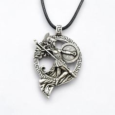 🎄Please order by December 10th to ensure the best chance for you to receive your item before Christmas!🎄 Channel the strength and wisdom of the goddess Athena with this stunning pendant necklace. This intricately detailed piece features Athena, the Greek goddess of wisdom, warfare, and crafts, depicted in her iconic warrior form. Materials: - Stainless Steel, Silver, Bronze Chain Length: -  50cm Pendant Size: - 45*60mm Features: - Detailed design - High-quality materials - Durable cord Care In Athena Necklace, Greek Goddess Of Wisdom, Greece Gifts, Warrior Goddess, Goddess Of Wisdom, Goddess Athena, Goddess Pendant, Goddess Jewelry, Athena Goddess