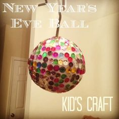 a new year's eve ball hanging from the ceiling