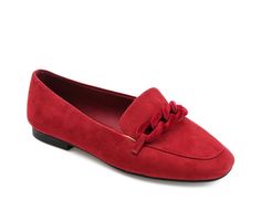 a woman's red loafer with a bow on the front and bottom part