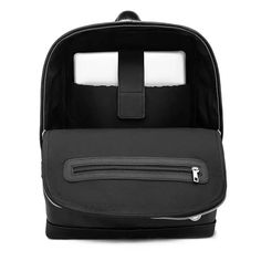 a black backpack with two compartments and zippers