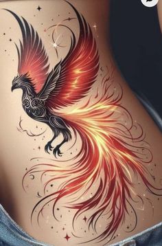 the back of a woman's stomach with a tattoo design on it, and an eagle