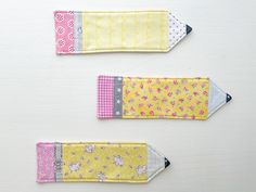 three pieces of fabric with different patterns on them