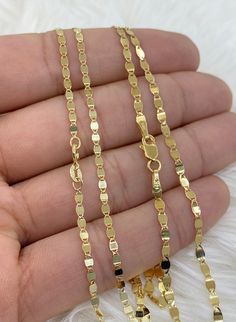 This Trending Dainty Mirror Link Solid 14K Gold Chain will be the perfect addition to your jewelry collection. Durable for daily use. Trending design. Custom Choker Lengths Available Ships Fast! Must have classic trendy necklace to add to your collection. Makes an amazing gift for anyone. Layers perfectly with other necklaces. Genuine/Authentic/Solid/Real 10K or 14K Gold Jewelry. Never plated or filled. Metal: Gold Purity: 14K (stamped for authenticity) Width: 2mm 2.5mm Length: 14in (choker), 15 Italian Gold Jewelry, Dainty Gold Chain, 10k Gold Chain, Real Gold Chains, Italian Chain, Trendy Necklace, Bride Jewelry, Gold Bride Jewelry, Gold Jewellery Design Necklaces