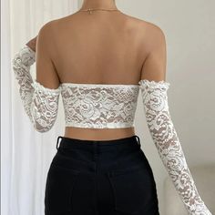 Steal the limelight with our beautiful underwire strapless crop top in solid white color. Designed to offer unmatched comfort, the top has an underwire support that keeps you secure throughout the day. But that's not all! The highlight of the crop top are its lace sleeves, bringing in an element of delicacy and charm to your look. Perfect for pairing with high waisted jeans or a chic skirt, it is an absolute must-have for your summer wardrobe! Color: WhiteSleeve Length: LongSilhouette: SheathType: Crop TopMaterial: PolyesterDecoration: LaceImported Update: This product is in high demand so you may experience a slight delay in shipping OUR PROMISE TO YOU: Easy Refunds. Buyer Protection. 30 Day Returns.Tracking Number for Every Order.Safe & secured payments via PayPal® & Shopify Payments whi White Off-shoulder Crop Top For Night Out, White Fitted Strapless Crop Top, White Fitted Tube Top With Built-in Bra, White Off-shoulder Tube Top For Night Out, White Stretch Tube Top For Night Out, White Stretch Crop Tube Top, White Fitted Tube Top With Removable Bra Pads, Fitted White Tube Top With Built-in Bra, White Cropped Tube Top For Night Out