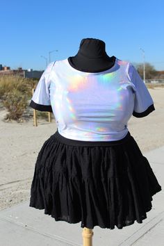 NOTE: All shirts are Currently Made To Order only with a 3 week turn around  Razzle Dazzle them in this truly holographic crop top with black accents on the cuffs, hems, and collar. Made from a comfy stretchy holo spandex this shirt can be customized with either a kawaii alien decal or an inverted star made from a super soft and stretchy elastic.  Relaxed measurement for the top is 42 inches across the bust and 19 inches from shoulder to hem Mannequin has a 50in bust and a 42 in waist for refere Kawaii Alien, Uchuu Kei, Plus Size Rave, Plus Size Tips, Edc Outfits, Mode Chic, Plus Size Models, Plus Size Skirts, Rave Outfits