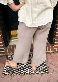 A wide legged cropped cotton gauze pant with striped applique detail at the hemline. Measurements 1 2 Waist Relaxed 26" 30" Inseam 24" 30" Cotton Gauze Pants, Gauze Clothing, Gauze Pants, Dress With Shawl, Boutique Homes, Fundraising Events, Judy Blue Jeans, Cotton Cardigan, Night Shirt