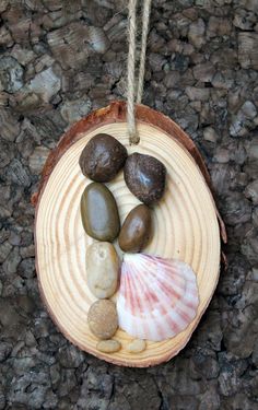 an ornament with rocks and shells on it