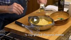 a video demonstrating how to make gravy cheese in a skillet on a cutting board