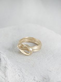 "A Perfect ring for an engagement & wedding or even as an elegant layer for an everyday ring mix. This is a truly unique piece, filled with elegance and charm and \"movement\". It is bound to become a cherished gift for your loved one. > 14K or 9K solid gold, also available in Goldplated Silver. > Can be made in yellow, white and rose 9k or 14k solid gold. Please choose a material > Ring width:approximately 4 mm > Handmade in Greece For additional sizes (also for quarter and half Anniversary Stackable Open Rings In Recycled Gold, Silver Stackable Rings In Recycled Gold For Anniversary, Recycled Yellow Gold Rings For Wedding, Recycled Yellow Gold Wedding Rings, Wedding Rings In Recycled Yellow Gold, Elegant Stackable Rings In Recycled Gold As A Gift, Timeless Wedding Rings In Recycled Gold, Gift Rings With Modern Twist, Elegant Adjustable Stackable Rings In Recycled Gold