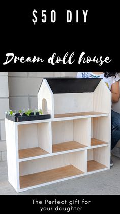 a doll house made out of wood with text overlay that reads $ 50 diy dream doll house the perfect gift for your daughter