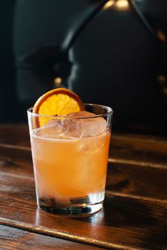 a glass with an orange slice on it and the words killer whiskey cocktails you'll fall for this season