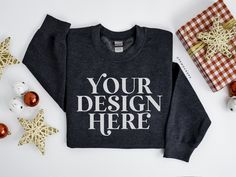 Christmas Holidays Themed, minimalist and modern lifestyle Gildan 18000 crew neck mockup for your graphic tee business. A simple mock up to elevate your storefront! Great for Print on Demand, HTV, sublimation, and more. This listing is for one mockup image of Gildan 18000 for your tshirt business, Just add your design! The JPG file is perfect to use in your Tee shop or social media marketing. Just download this image, open it in your favourite editing software drop your t-shirt design on top. DETAILS: Upon purchase you will be able to download the file without the logo. You will receive one high resolution JPG file. COPYRIGHT: You do not have permission to resell or redistribute the blank image. You may use it commercially and personally. You do not have permission to alter this image in a Customizable Crew Neck T-shirt For Winter, Htv Sublimation, Tshirt Business, Grey Crewneck, Modern Lifestyle, Fall Sweatshirt, Editing Software, Shirt Mockup, White Sweatshirt