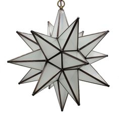 a stained glass moravian star ornament hanging from a chain on a white background