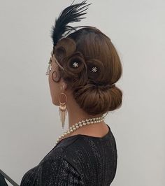 1920s Hairstyles for Long Hair: 21 Styling Ideas 1920s Hairstyles For Long Hair Updo, 1920s Bun Hairstyle, 20s Updos For Long Hair, Hairstyles 1920s Gatsby, Womens 1920's Hairstyles, 1920s Side Bun, How To 1920s Hairstyles For Long Hair, 20s Hairstyles Long Hair, 1920s Hair Updo Gatsby