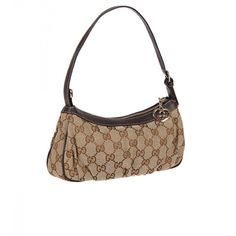 Heart Shaped interlocking G zip tab detail on this Gucci bag sets it apart. Crafted from original beige and ebony GG fabric bag with Brown leather trim and adjustable strap handle. Compact and chic, this delightful bag has a light gold hardware zip closure and gold chain zip tab with interlocking GG heart shaped pendant. Perfect for travelling or as a stylish shoulder bag.Composition: GG Canvas & LeatherShoulder strap drop: 20cm - 24cm Bag measures: H:12cm x W:23 cm. x D:5cm.Product Code: 245938 Gucci Purse, Heart Shaped Pendant, Stylish Shoulder Bag, Gucci Shoulder Bag, Heart Shape Pendant, Brown Bags, Fabric Bag