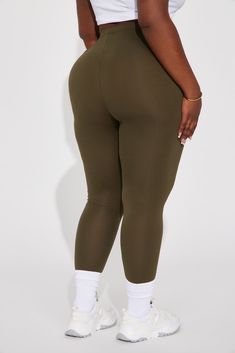 Available In Black, Charcoal, Olive, Red, Heather Grey, Navy, And White. Leggings Mid Rise Stretch 95% Cotton 5% Spandex Imported | Lean On Me Leggings in Olive Green size Medium by Fashion Nova Compressive Green Leggings For Loungewear, Green Elastane Leggings For Loungewear, Green Elastane Leggings, Olive Fashion, Lean On Me, Hipster Outfits, Lean On, White Leggings, Black Charcoal