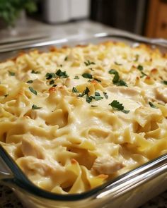 a casserole dish with chicken and cheese