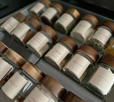 several jars filled with different types of spices