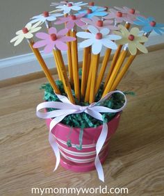 there is a pink flower pot with pencils in it and the words happy teachers day